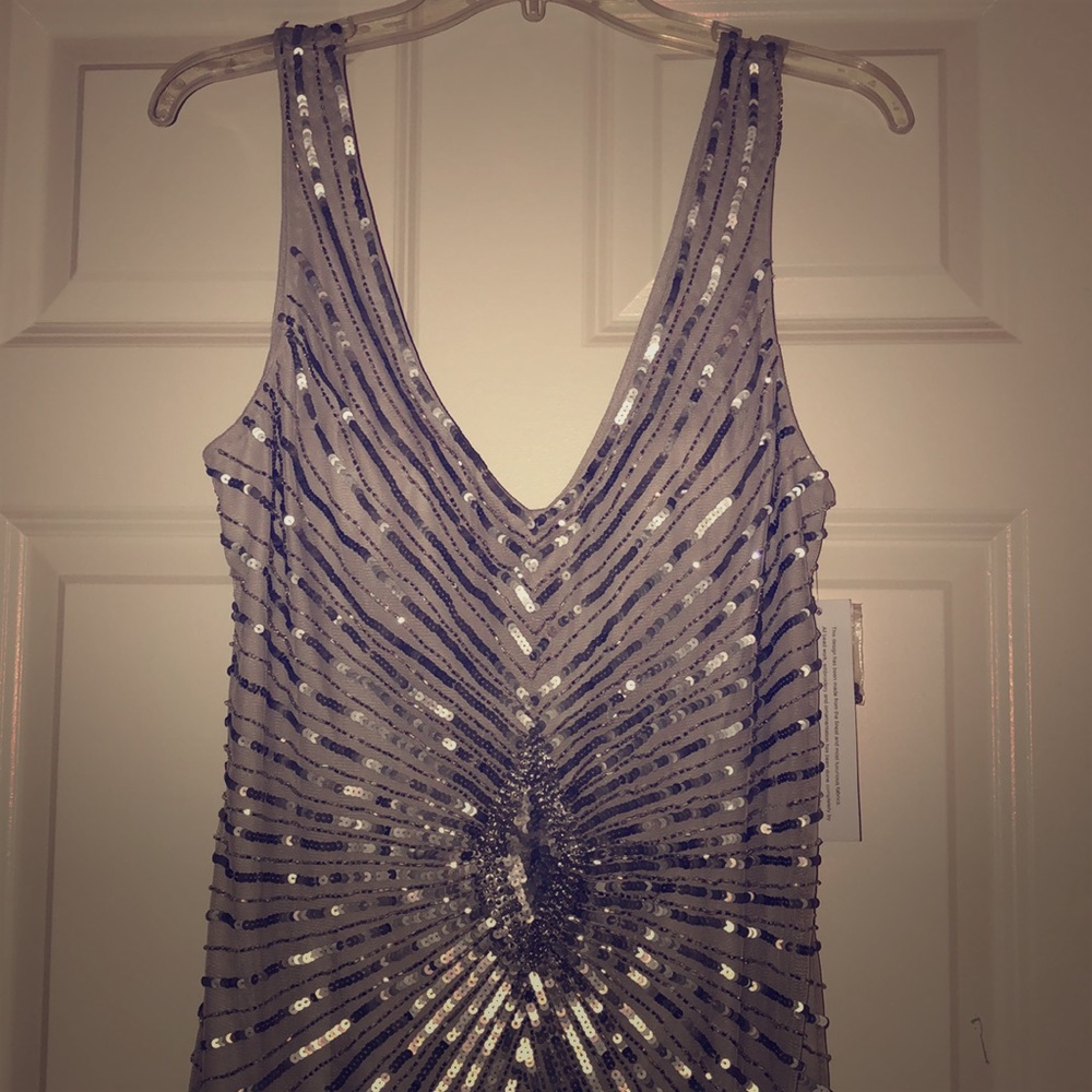 Brand new!! Silver sequin dress, hand beaded!
